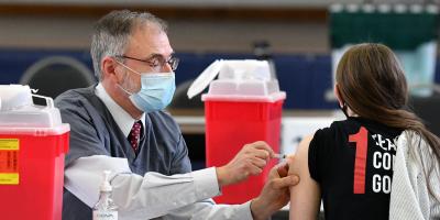 Dr. Harris administering vaccines